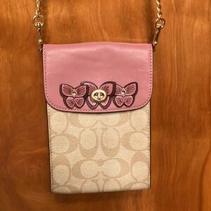 COACH. SMALL CROSSBODY. CREDIT CARD SLOTS. TAN & PINK BUTTERFLIES.USED ONCE. EUC